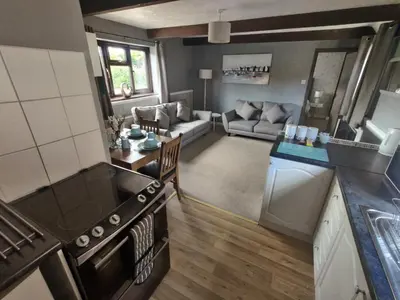 an aerial view of a kitchen and living room at Birds Farm in Colchester