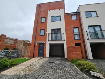 a brick building with a door and a courtyard at Ipswich - 3 Beds - Sleeps 6 - Private Garden in Ipswich