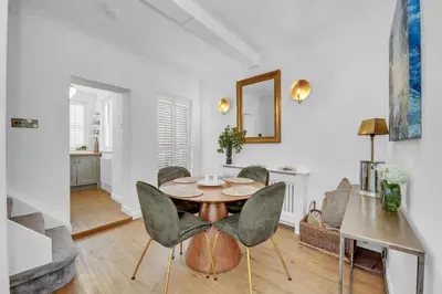 a dining room with a table and chairs at Charming Church Walk, Long Melford - 2 bedroom property with parking in Long Melford