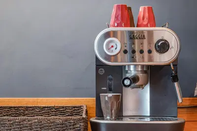 a coffee machine sitting on top of a table at The Blue Anchor House - close to London in Hertford