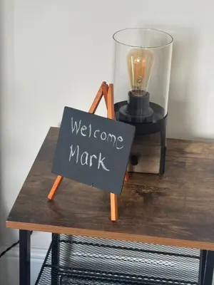 a sign on a wooden table with a welcome marmite marmite sign on top at Riverview Colchester in Colchester