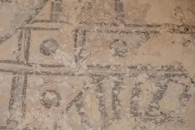 ancient writing on the floor of a building at Medieval cottage in rural village - Duke's Lodge in Bildeston