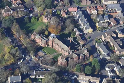 an aerial view of a large group of houses at Westminster College in Cambridge