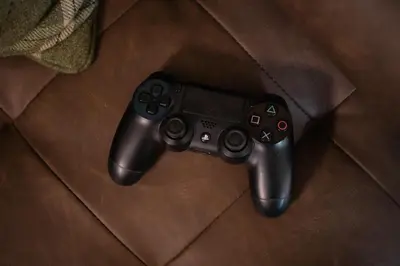 a video game controller sitting on top of a table at Fun house in the heart of Colchester in Colchester