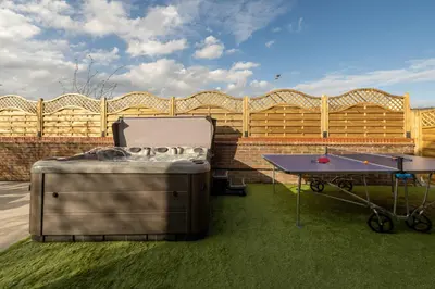 a ping pong table and a ping pong table at Fun house in the heart of Colchester in Colchester