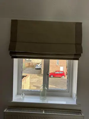a window with a window shade in a room at Stylish house centrally located in Bury Saint Edmunds