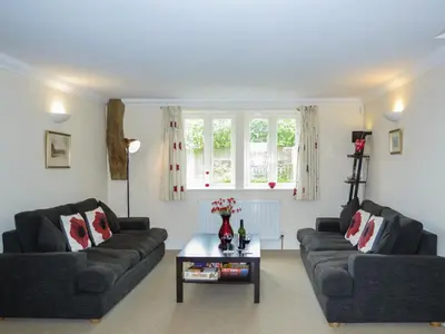a living room with two couches and a coffee table at 3 Hazlewood in Aldringham