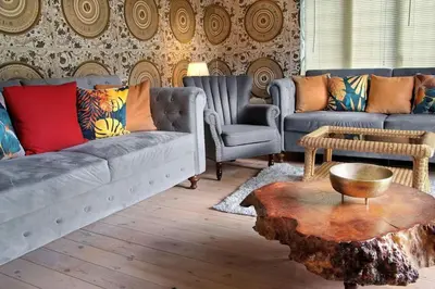 a living room with two couches and a coffee table at Deluxe 2 or 3 bed Cinema Games Room Pool Table Hot Tub in Great Sampford