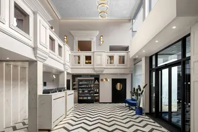 a large room with a kitchen and a lobby at Delta Hotels by Marriott Colchester in Colchester