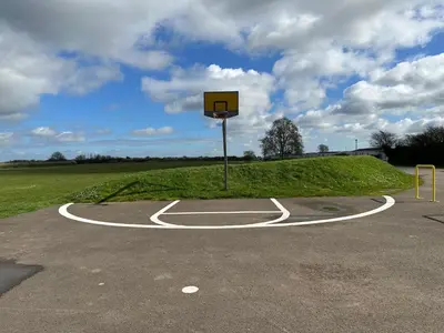 a basketball hoop in a parking lot at D34 Steeple Bay Caravan Site in Chelmsford