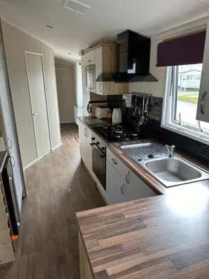 a kitchen with a sink and a stove at 13 Chorley close in Walton-on-the-Naze