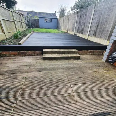 a parking lot with stairs and a fence at Beautiful and Cozy 2 Bedroom Apartment Billericay in Billericay