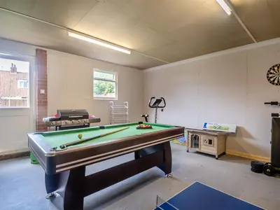 a billiard room with a pool table in it at The Great Escape in Ipswich