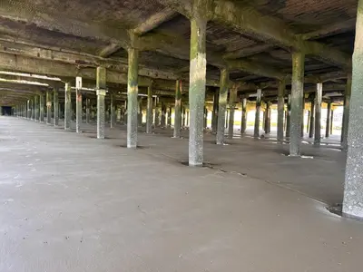 an empty parking lot with columns in an empty building at High view house, 3 bed flat, Number 41A in Walton-on-the-Naze