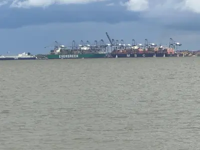 a large body of water with a ship in the background at Coastal Nest - Premium flat,3 Minutes to the Beach in Walton-on-the-Naze