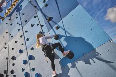 a young girl on a climbing wall at Coastal caravan retreat in Brightlingsea