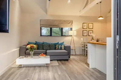 a living room with a couch and a table at 2 Bed in Heveningham oc-w29033 in Heveningham