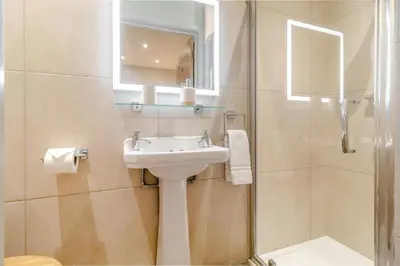 a bathroom with a sink and a shower at 3 Bed in Heveningham oc-w29030 in Heveningham