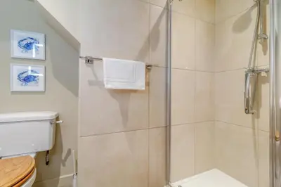 a bathroom with a shower and a toilet at 3 Bed in Heveningham oc-w29030 in Heveningham