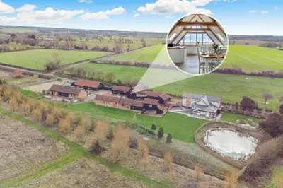 an aerial view of a house in a field at 1 Bed in Heveningham oc-w29032 in Heveningham