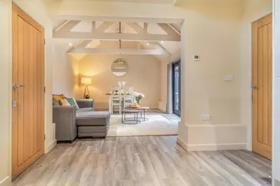 a living room with a couch and a table at 2 Bed in Heveningham oc-w29029 in Heveningham