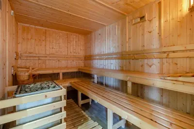 an empty wooden sauna with wooden benches at 2 Bed in Heveningham oc-w29029 in Heveningham