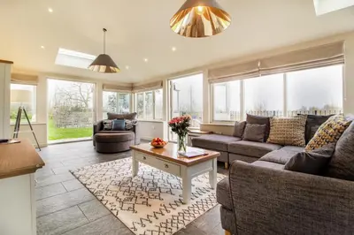 a living room with a couch and a table at 2 Bed in Heveningham oc-w29034 in Heveningham