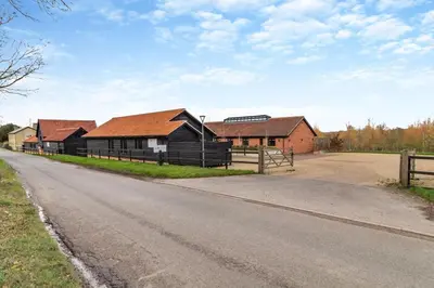 a row of houses on the side of a road at 2 Bed in Heveningham oc-w29034 in Heveningham