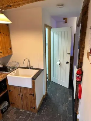 a kitchen with a sink and a counter top at The Hideout in Linton