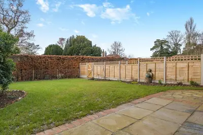 a wooden fence in a yard next to a field at 1 Bed in Tasburgh oc-t28242 in Ashwellthorpe