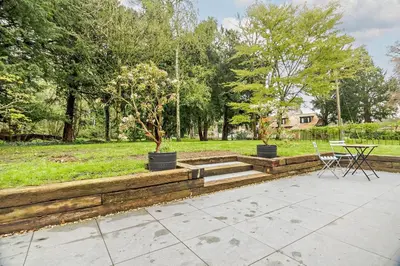 a garden with a table and a tree in a park at 2 Bed in Ketteringham oc-p27381 in East Carleton