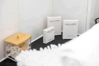 three boxes sitting on a counter in a room at Beautiful House by Station with Private Parking in Cambridge