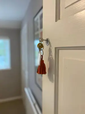 an open door with a red object in a hallway at relaxed and peaceful in St Ives