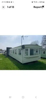 a rendering of a tiny house with the front of it at Rose Manor in Little Clacton