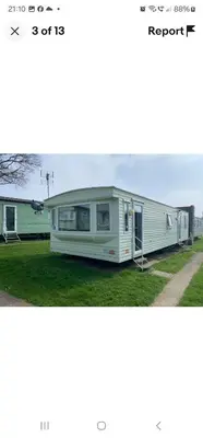 an image of an rv parked in a yard at Rose Manor in Little Clacton