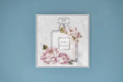 a picture of a perfume bottle with pink flowers at Ipswich Town center Gem Sleep 5 in Ipswich