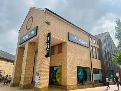a brick building with people walking in front of it at Chelmsford City Centre Modern Duplex With Parking, Wi-Fi & Netflix in Chelmsford