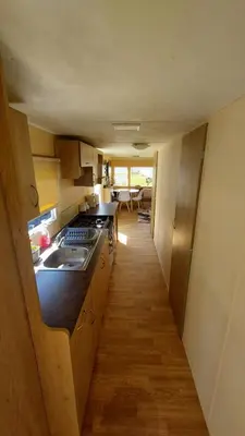 a kitchen with a sink and a stove top oven at SKYLA VISTA Deluxe in Clacton-on-Sea