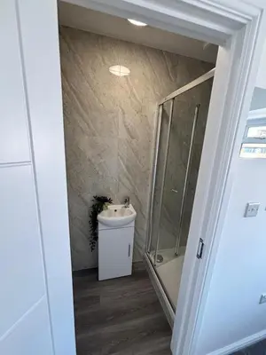 a bathroom with a shower and a toilet and a sink at Cosy rooms in Cambridge in Cambridge