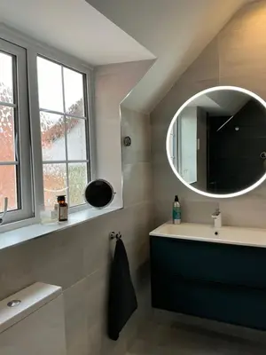 a bathroom with a sink and a mirror at Frinton45 in Frinton-on-Sea