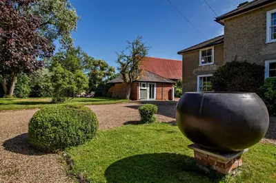 a large metal bowl in the yard of a house at 1 Bed in Cratfield oc-t29434 in Cratfield