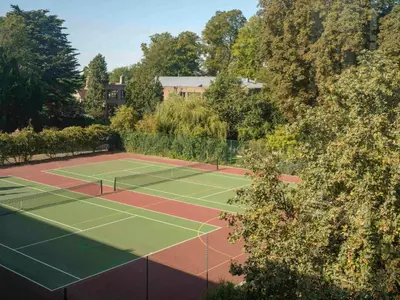 an overhead view of a tennis court at Murray Edwards College, Cambridge in Cambridge