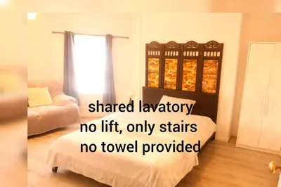 a room with a bed and a room with aether markupno lift only at Cambridge city centre accommodations in Cambridge