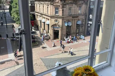 a view of a street from a window of a building at Nero view, Southend City High Street in Southend-on-Sea