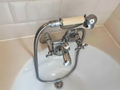 a blow dryer sitting on top of a sink at Luxury 1 Bedroom Apartment in Southend w Parking in Southend-on-Sea