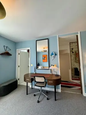 a office with a desk and a chair in a room at Stunning designer House in excellent city location in Cambridge