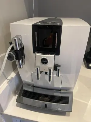 a coffee maker sitting on top of a counter at Stunning designer House in excellent city location in Cambridge