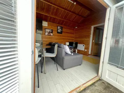 a living room with a couch and a table at Duchess Lodge In Colchester 1BR,Couples, Contractors,Business Travellers, Free WIFI, Secure Parking in Colchester