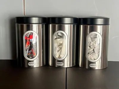 three metal trash cans sitting on a counter at Duchess Lodge In Colchester 1BR,Couples, Contractors,Business Travellers, Free WIFI, Secure Parking in Colchester