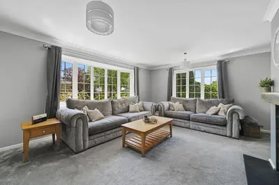 a living room with two couches and a coffee table at 10 Holly Close in Westley